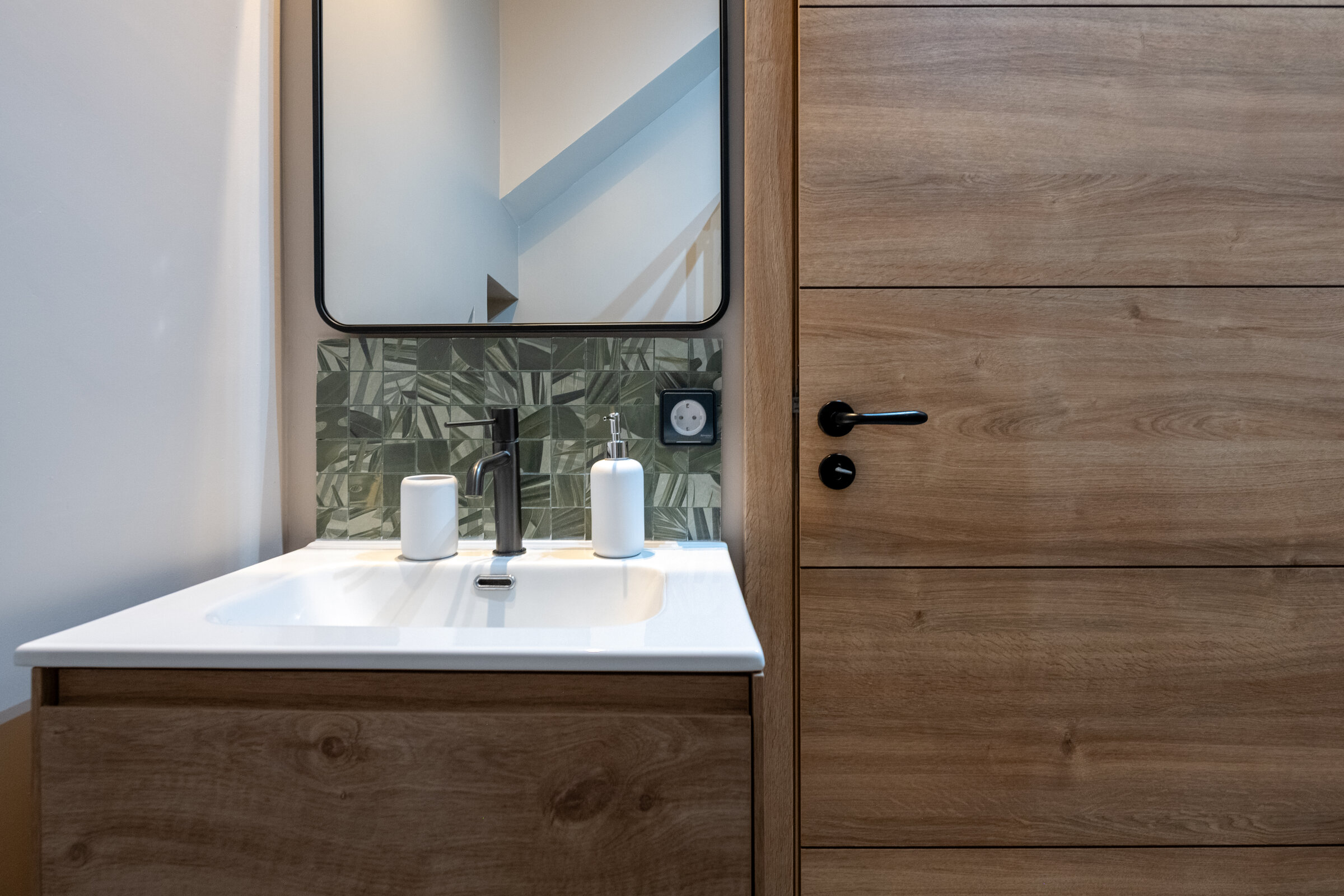 Bathroom with double vanity and mirror